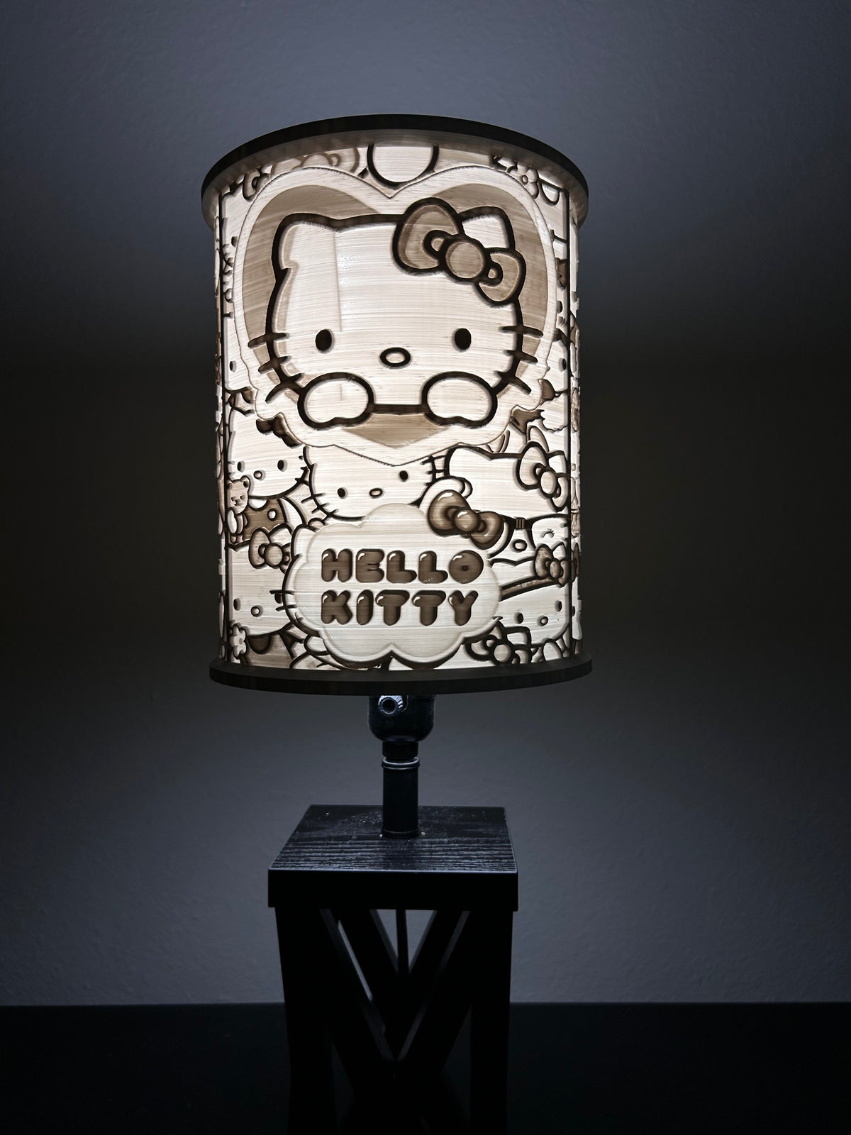 Illuminated Hello Kitty-inspired lampshade with a large character portrait, bow, hearts and Hello Kitty lettering