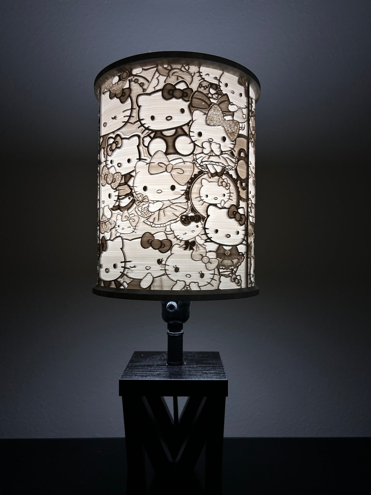 Side view of Hello Kitty-inspired lampshade showing a wraparound collage of characters and bows